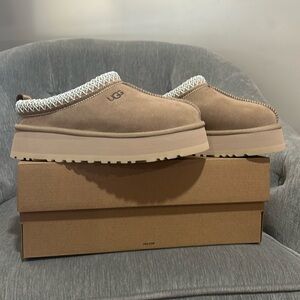 NWT Ugg Tazz Slippers in sand.  Women’s size 5. New in box, never worn